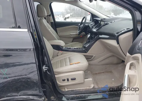 2015 Ford Escape Titanium z USA, uszkodzony, nr VIN 1FMCU9J91FUC20067